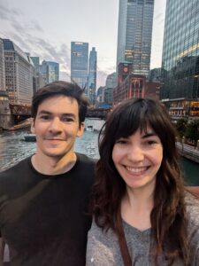 Photo of Theora and husband David standing on a bridge over the Chicago River.